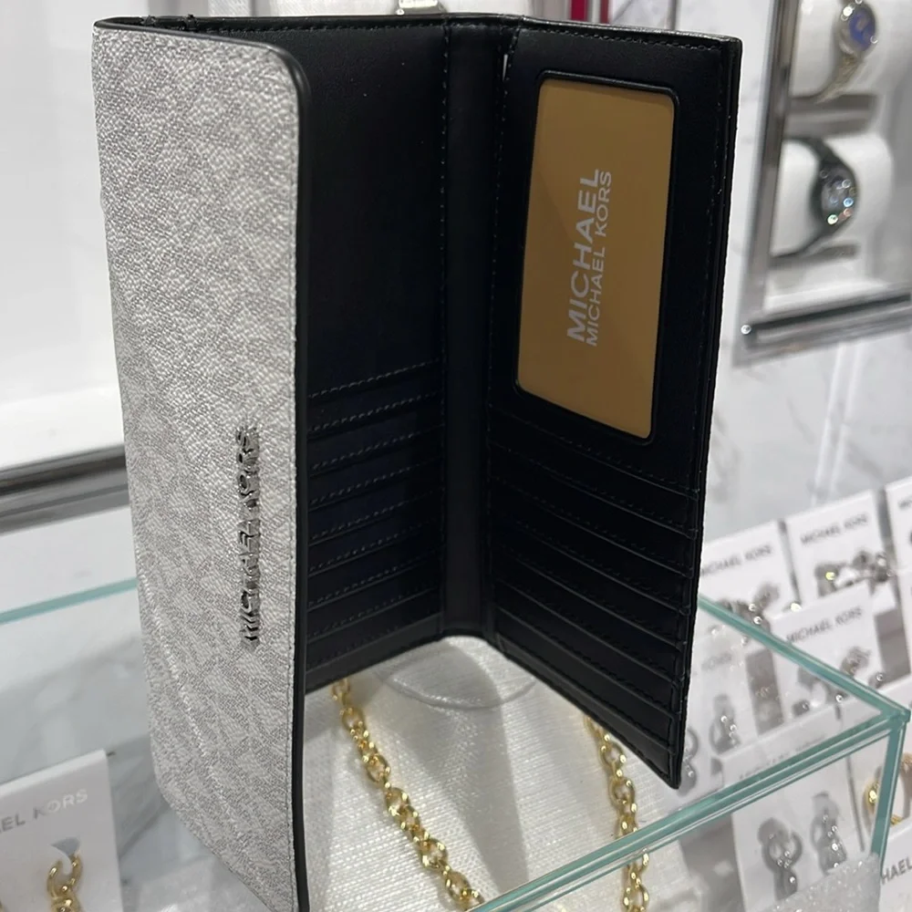 Michael Kors Jet Set Large Logo Trifold Wallet
Optic White Multi
NWT - Picture 10 of 16